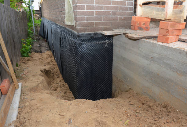 Happy homeowners after waterproofing job in Ferndale